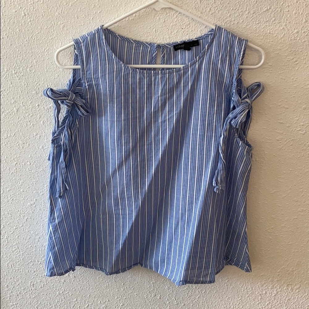 NWT 2 Sleeveless shirts for the price of one!